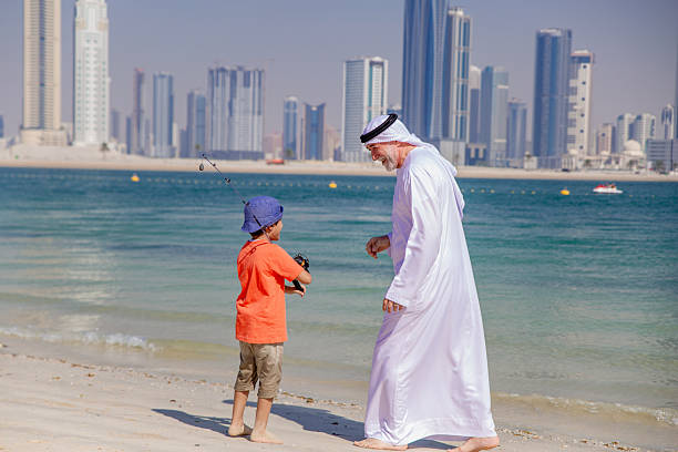 istock Two generations fishing together 2221381045