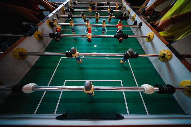 istock Intense Game of Foosball in Action – Close Perspective 2221390721