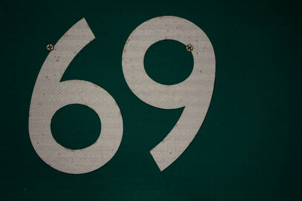 istock number 69 reflective traffic sign 2221395289