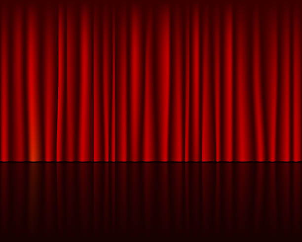 istock Elegant red velvet curtains with a reflective stage floor. Perfect for theater, performance, or dramatic presentations. Symbolizes reveal, opening, or grandeur. 2221396252