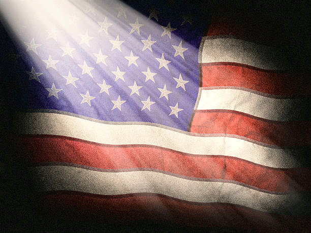 istock Full frame American flag with beam of light 2221398923