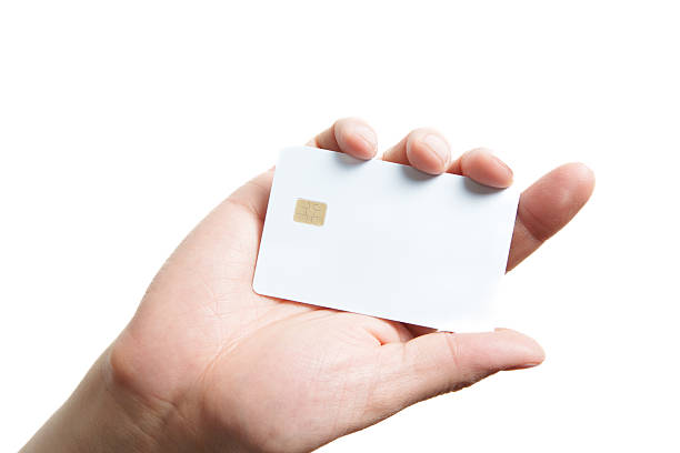 istock Hand holding white credit card on white background 2221399012