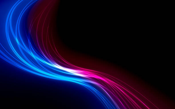 istock Dynamic background with glowing blue and pink light trails on black 2221401209