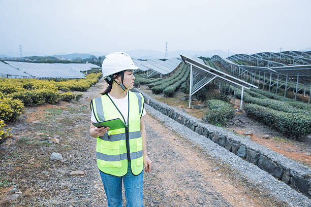 istock Woman engineer working in solar panel power plant 2221413325