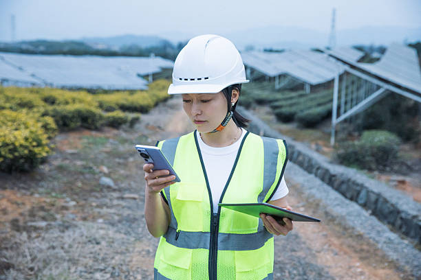 istock Female inspector uses mobile phone 2221414078