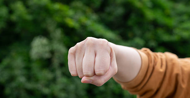 Woman's hand with a clenched fist