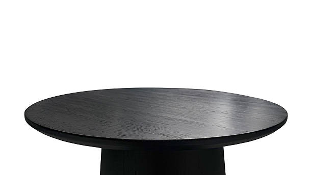 istock Minimalist black round coffee table isolated on background with clipping path, ideal for modern home decor, product display. 2221428701