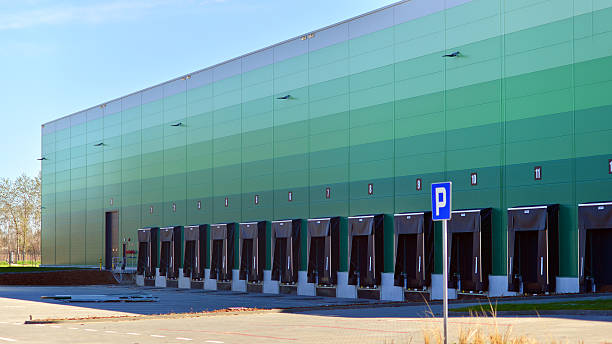 istock Facade of an industrial building and warehouse. 2221433290