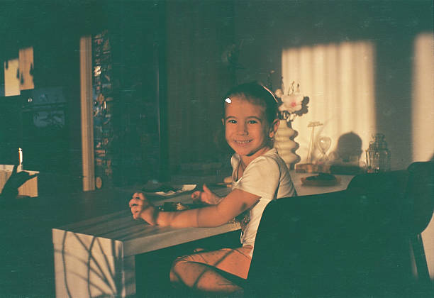 istock Beautiful girl eating in the kitchen 2221436184