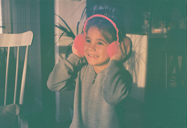 Beautiful girl playing in domestic room. Shoot by film.