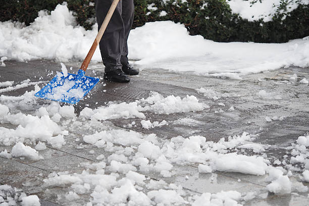 istock Snow removal process at a residential area during winter season 2221436847
