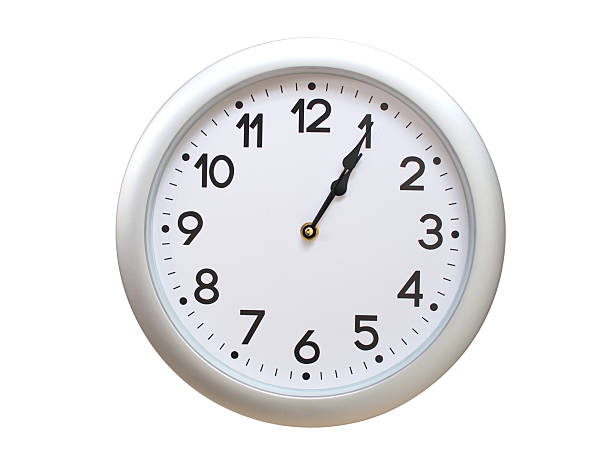 Round Silver Wall Clock Showing 01:05 or 13:05 Isolated-White. Useful for concepts like noon, midnight, deadline, countdown, or time management.