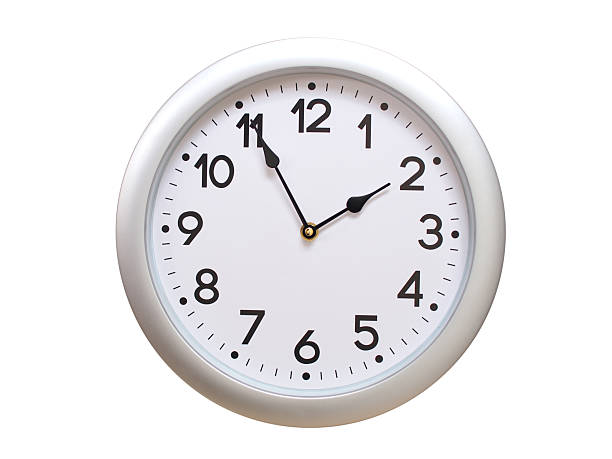 Round Silver Wall Clock Showing 01:55 or 13:55 Isolated-White. Useful for concepts like noon, midnight, deadline, countdown, or time management.