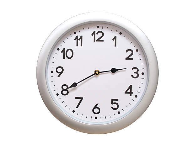 istock Round Silver Wall Clock Showing 02:40 or 14:40 Isolated-White. Useful for concepts like noon, midnight, deadline, countdown, or time management. 2221443724