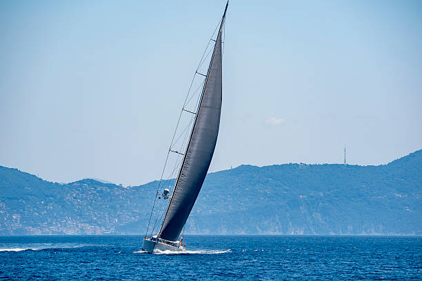 istock regatta boat in the wind full speed 2221444357