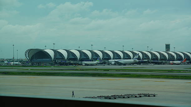 Bangkok, Thailand, May 29, 2025Suvarnabhumi Airport’s runway stretches across vast open space, built with durable surfaces to handle frequent landings and takeoffs efficiently.