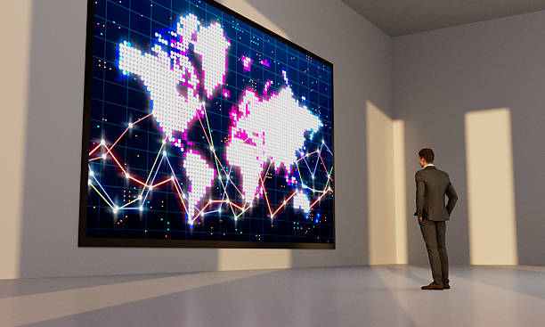 istock Businessman watching global finance trend 2221446840