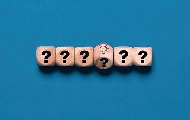 istock Flipping wooden block cube change from question to glowing lightbulb for smart thinking and solution problem. It is creative thinking idea and innovation concept. 2221447702