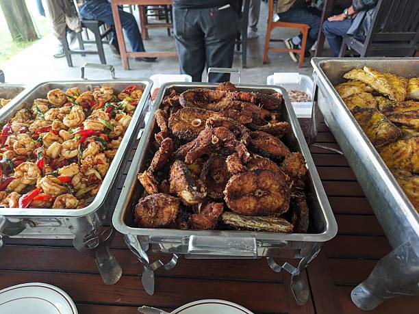 istock vegetable and fish dishes on a large tray 2221451820