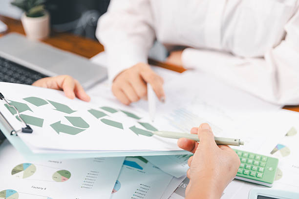 istock Business people working on sustainable innovation project. renewable energy concept. Teamwork Meeting, partner on model building company office technology, based green businesses and global warming. 2221453883