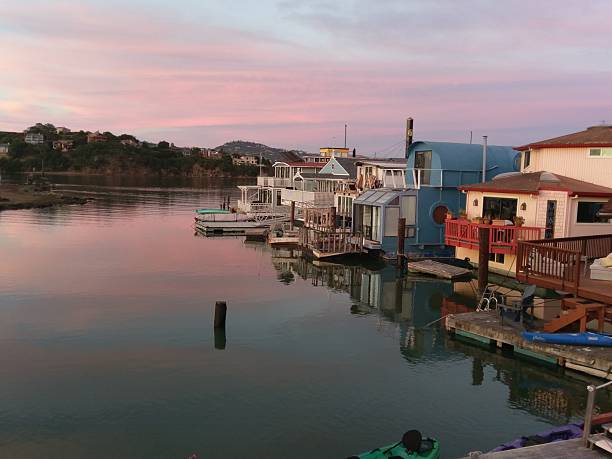 istock Tranquil Sunset Over Floating Homes on Scenic Waterfront 2221455089