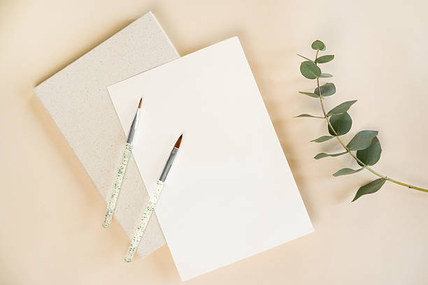 istock Blank canvas and art supplies arranged on a soft surface ready for creative project during daytime 2221457732