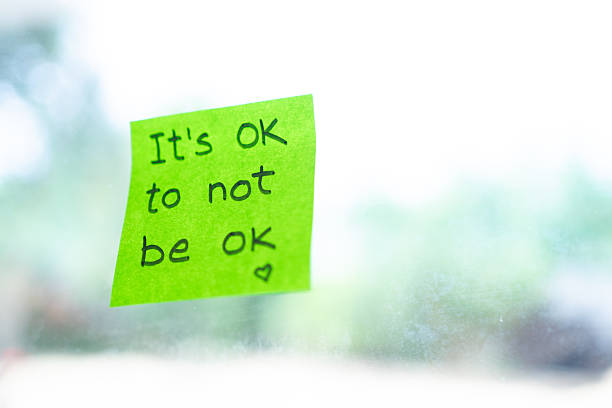 istock It's okay to not be okay encouraging message on sticky note 2221459314