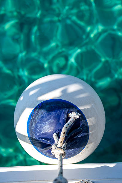 View from the deck of the ship on the turquoise colored surface of the sea