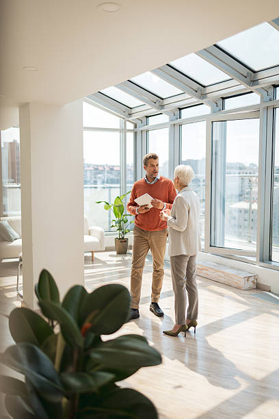 istock Business professionals discussing strategy in a modern office with natural lighting 2221467466