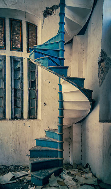 istock A spiral staircase is blue and white 2221467653