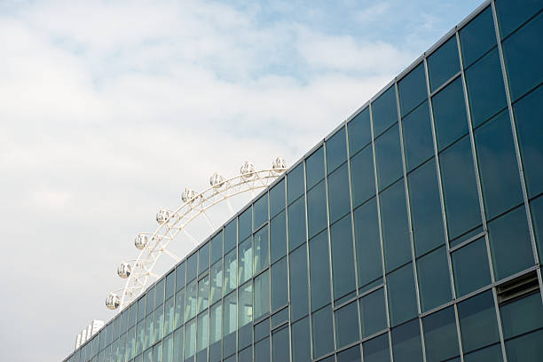 istock The Intersection of a Ferris Wheel and Modern Architecture 2221471771