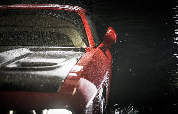 istock Stunning Red Sports Inside a Car Wash 2221473737