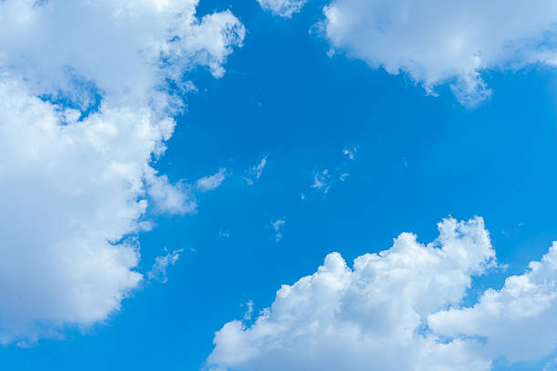 istock Vibrant Blue Sky with Fluffy White Cumulus Clouds Scenic Nature Background Image 2221480022
