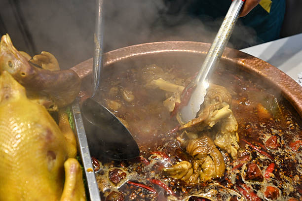 istock Steaming Hot Spicy Hot Pot with Various Ingredients 2221482060