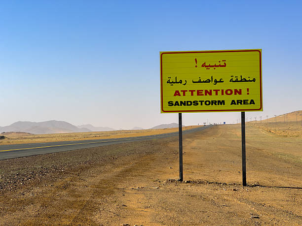 istock This road passes through the desert in Saudi Arabia. (Attention Sandstorm Area) 2221484390