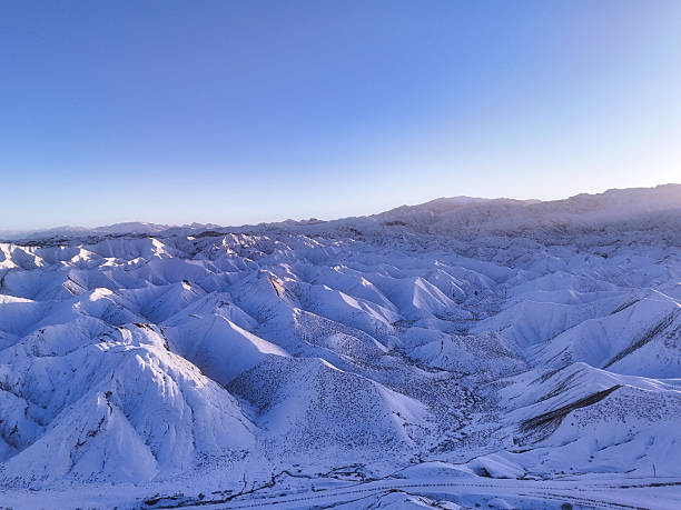 istock Magnificent Scenery of Snow-Covered Mountains 2221485219