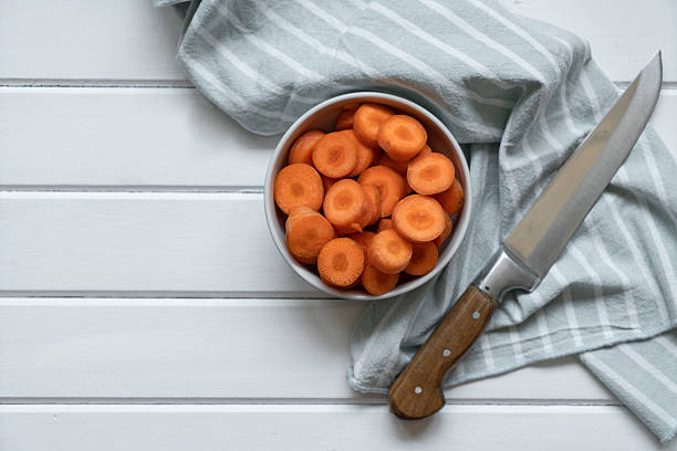 Chopped raw carrots in a saucepan