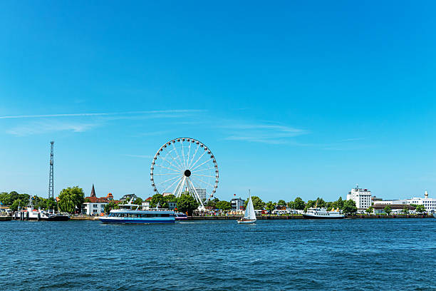 istock View over the river Warnow with ferris wheel in Warnemuende, Germany 2221486790