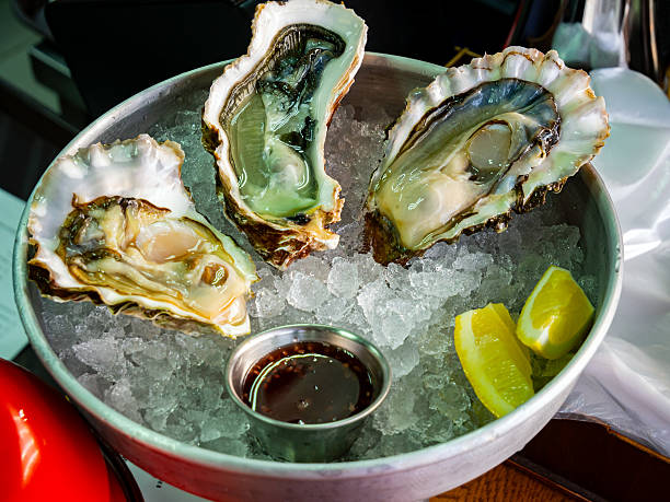 istock Serving mussels on ice with sauce and lemon 2221488121