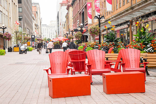 Ottawa, Canada - September, 24, 2024:  People can enjoy their leisure time shopping or relaxing with ice-cream at the seat on thefamous Sparks St. in Ottawa.
