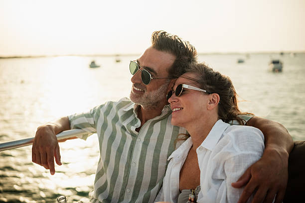 istock Couple enjoying romantic sunset on a yacht 2221494202