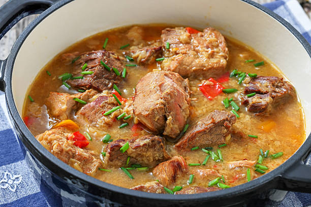 Cooking chicken with spicy sauce, Italian cuisine - Arrabbiata garlic chicken with parsley is cooked in a pan