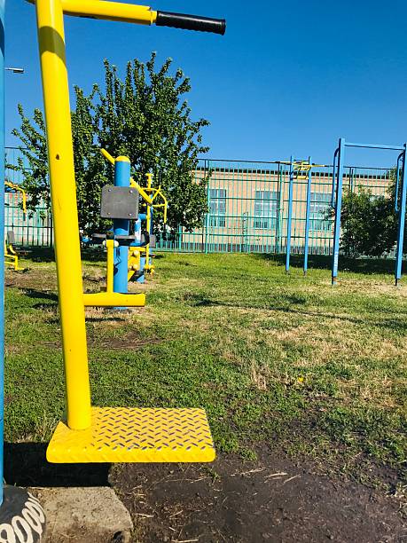 istock Exercise equipment for individuals with special needs in a park 2221498364