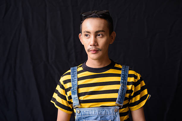 Portrait of nonbinary genderfluid young Asian gay man