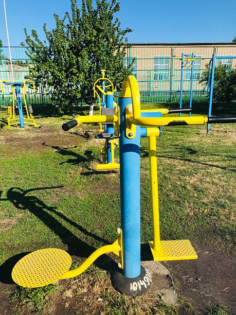 istock Exercise equipment for individuals with special needs in a park 2221502696