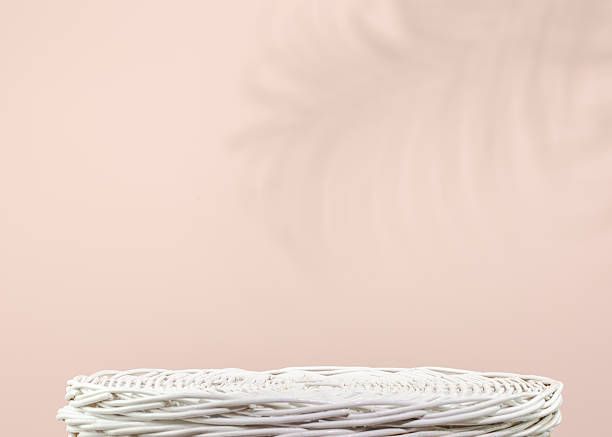 istock White empty woven podium for presentation or advertising against blue background 2221514927