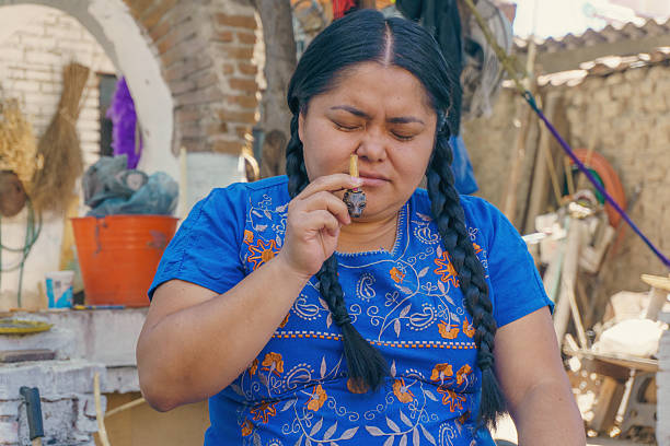 Close-up portrait of an indigenous woman weaver from the Peruvian village of Chinchero
