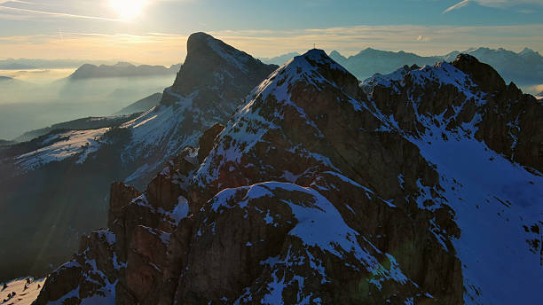 istock Rocky snow mountains at sunrise aerial 2221540344