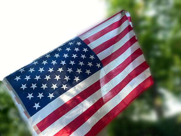 istock USA flag on white background 2221540519