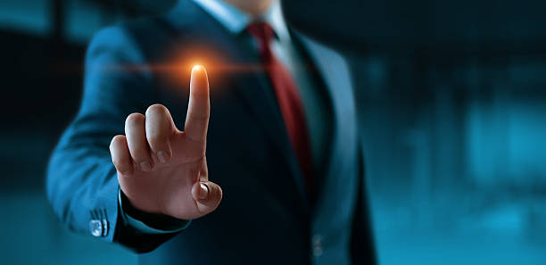 istock The businessman touch virtual screen. Man presses virtual button. Business Technology Concept 2221544707